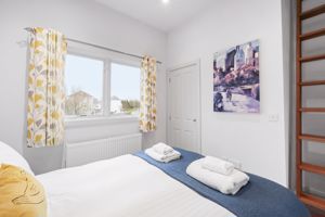Bedroom 3 with mezzanine- click for photo gallery